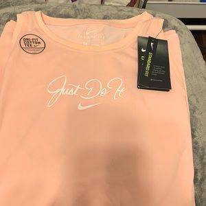 Nike Tee size large peach color